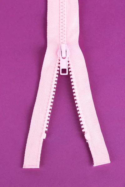 Zipper on purple background — Stock Photo, Image