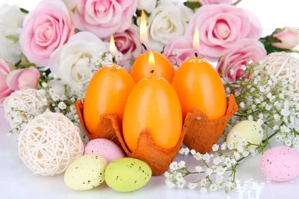 Easter candles with flowers close up — Stock Photo, Image