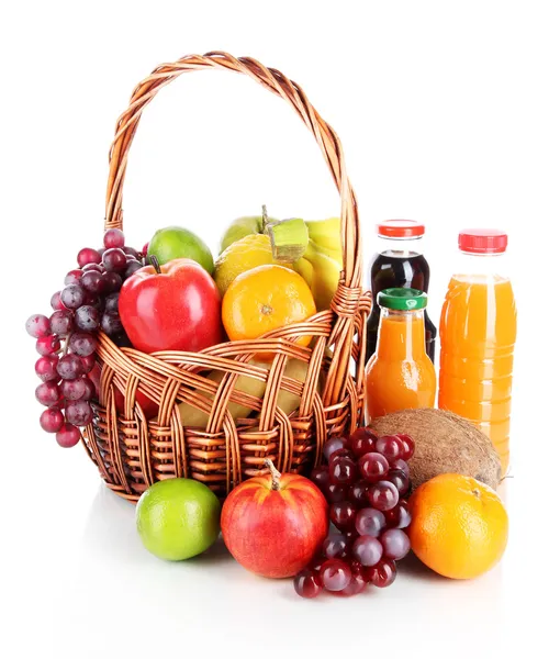 Different fruits in wicker basket with juice isolated on white — Stock Photo, Image