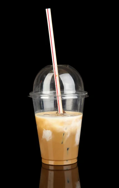 Cold coffee with ice in glass isolated on black — Stock Photo, Image