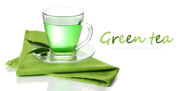 Transparent cup of green tea on napkin, isolated on white — Stock Photo, Image