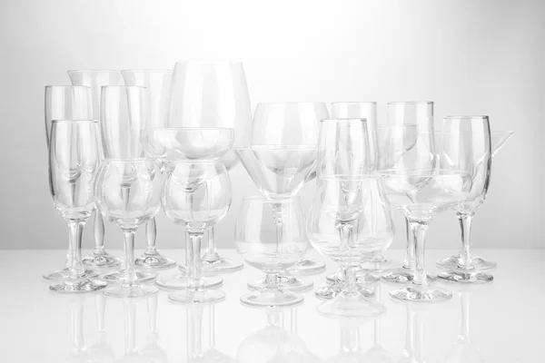 Cocktail and wine glasses, on gray background — Stock Photo, Image