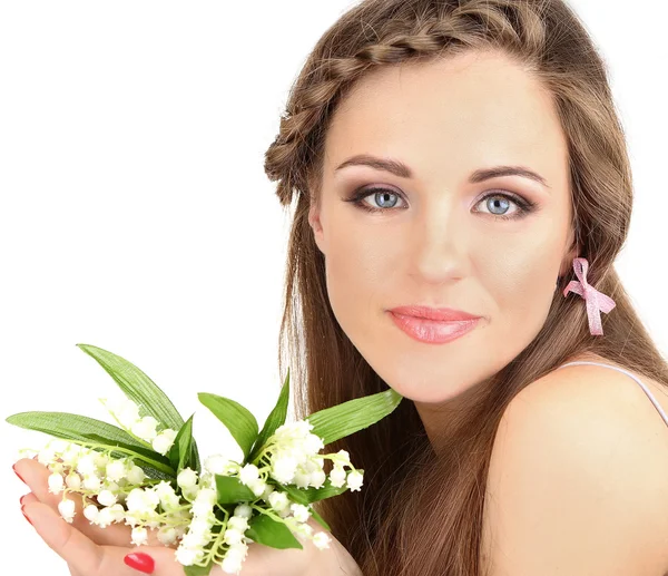 Mujer joven con hermoso peinado y flores, aislado en blanco — Foto de Stock