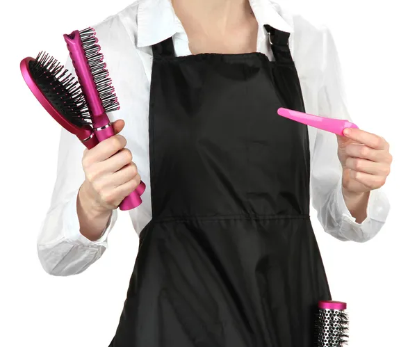 Peluquería en uniforme con herramientas de trabajo, aislado en blanco — Foto de Stock