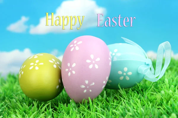 Colorful easter eggs on grass — Stock Photo, Image