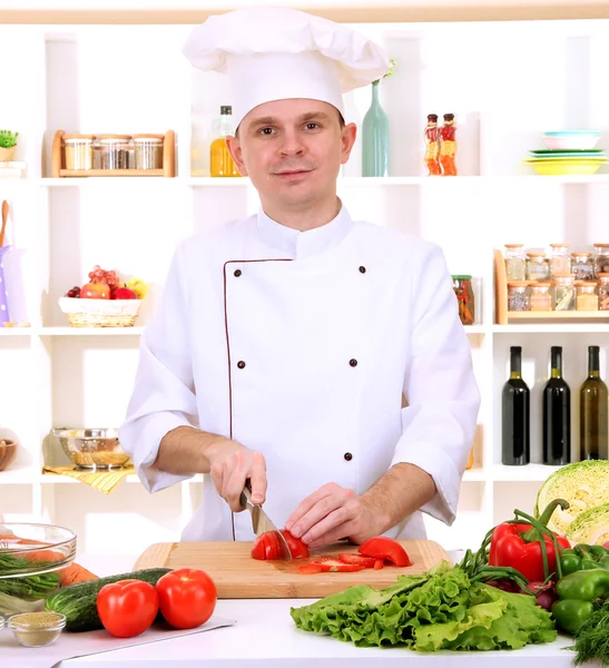 Chef cooking in kitchen — Stock Photo, Image