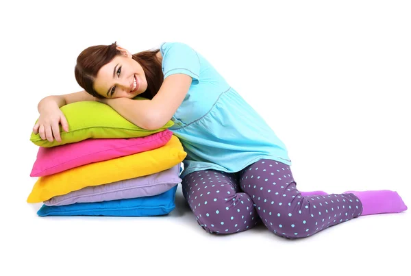 Beautiful young girl with pillows isolated on whit — Stock Photo, Image