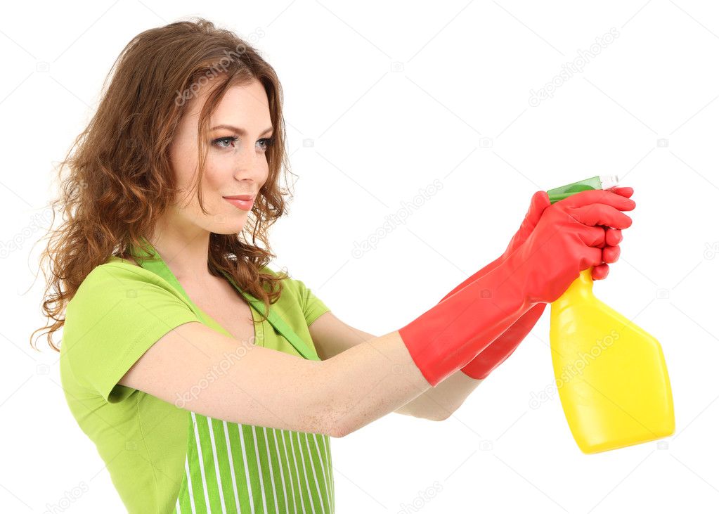 Young woman holding sprayer, isolated on white