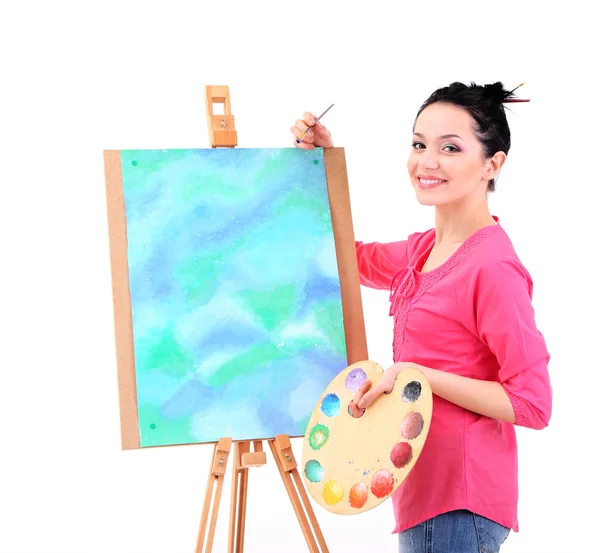 Beautiful young woman painter at work, isolated on white — Stock Photo, Image