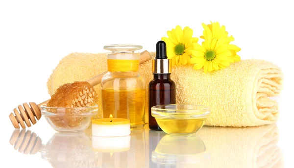 Fragrante spa miele con oli e miele isolato su bianco — Foto Stock