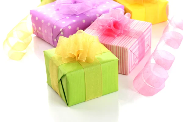 Bright gifts with bows isolated on white — Stock Photo, Image