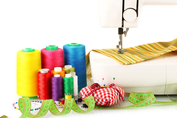 sewing machine and fabric isolated on white