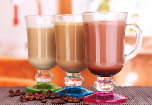 Layered coffee in glass on table on bright background — Stock Photo, Image