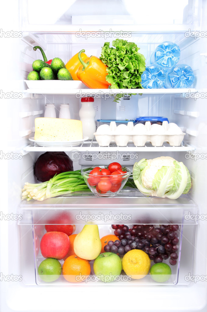 Refrigerator full of food — Stock Photo © belchonock 24456803