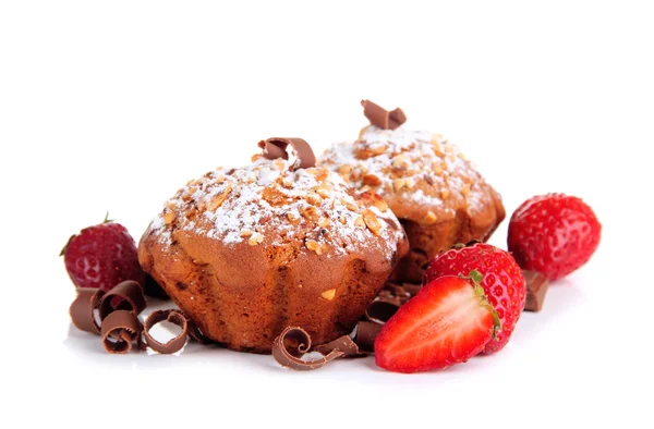 Tasty muffin cakes with strawberries and chocolate, isolated on white — Stock Photo, Image