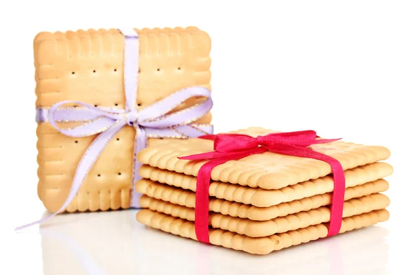 Sweet cookies tied with colorful ribbons isolated on white — Stock Photo, Image