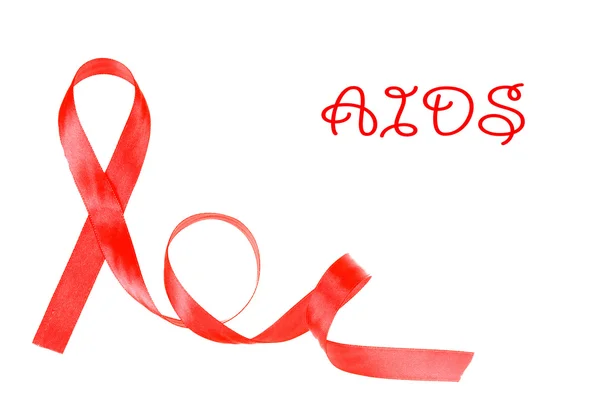 Red breast cancer ribbon isolated on white — Stock Photo, Image