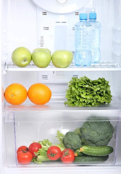 Open refrigerator with vegetarian food — Stock Photo, Image