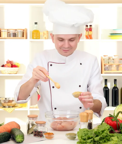 Chef cooking in kitchen — Stock Photo, Image