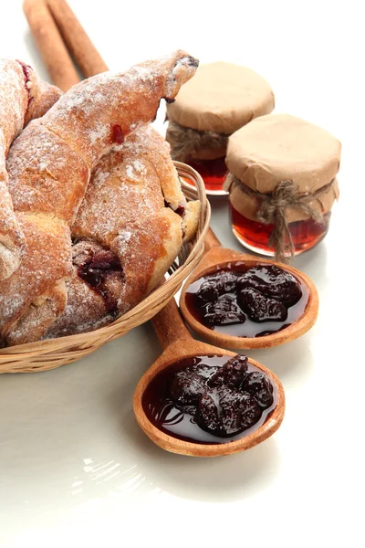 Taste croissants in basket and jam isolated on whit — Stock Photo, Image