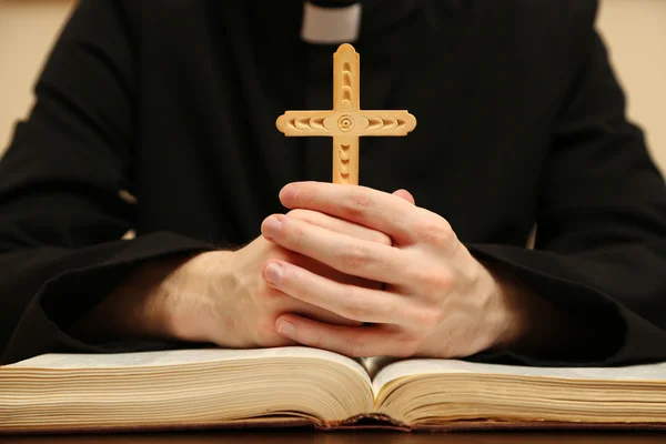 Priest reading from the holy bible, close up — Stock Photo, Image