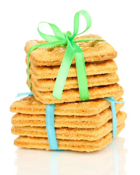 Dolci biscotti legati con nastri colorati isolati su bianco — Foto Stock