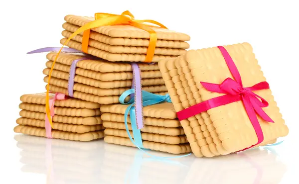 Galletas dulces atadas con cintas de colores aisladas en blanco —  Fotos de Stock