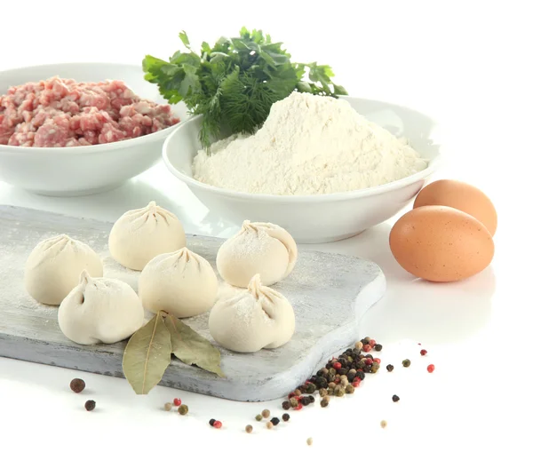 Raw Georgian khinkali on wooden desk and ingredients, isolated on white — Stock Photo, Image