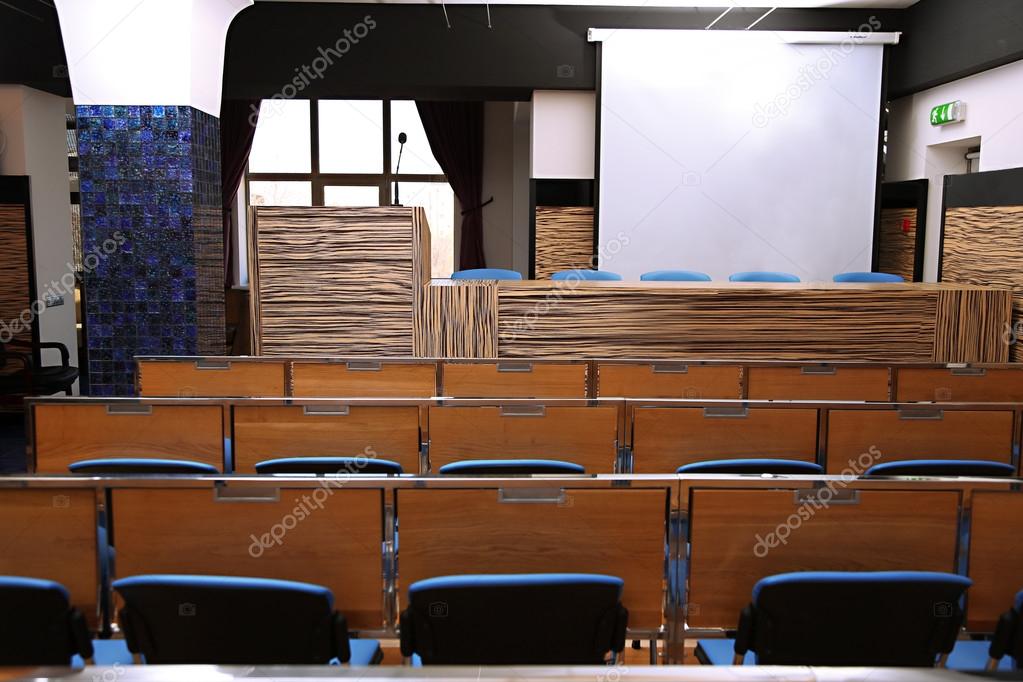 Interior of empty conference room with tribune