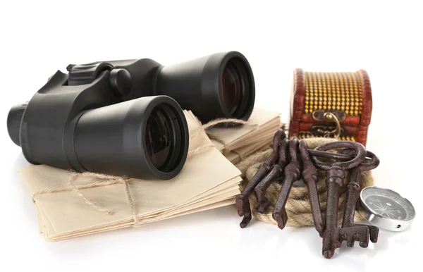 Black modern binoculars with letters and old keys isolated on white — Stock Photo, Image