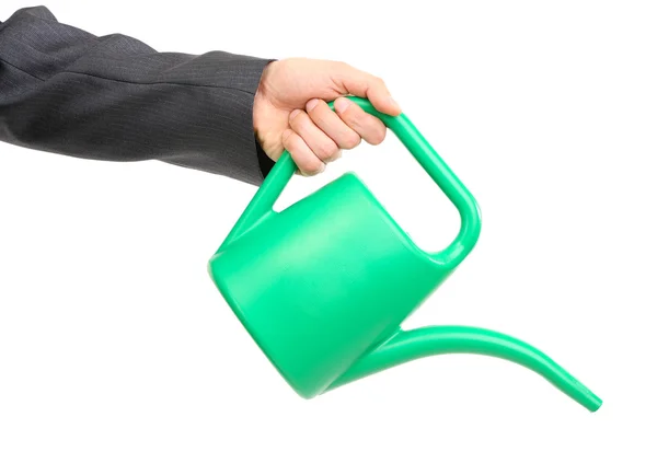 Hand of a businessman pouring water from watering can isolated on white — Stock Photo, Image