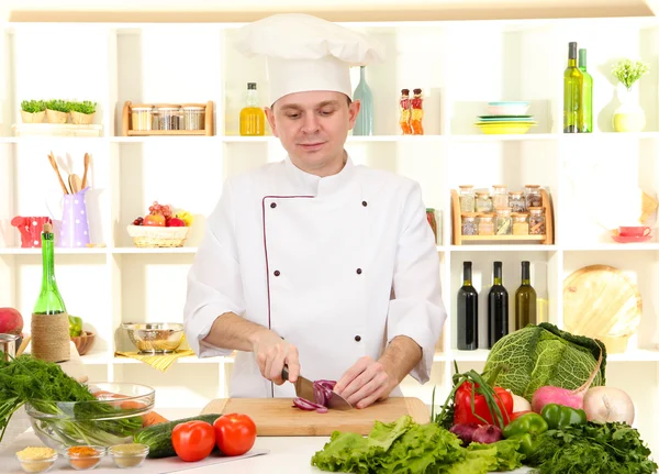 Chef cooking in kitchen — Stock Photo, Image