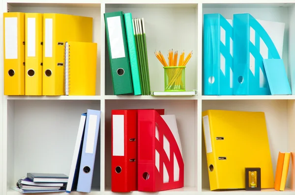 White office shelves with different stationery — Stock Photo, Image