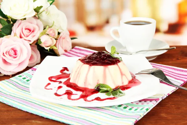 Panna Cotta with raspberry sauce, on bright background — Stock Photo, Image