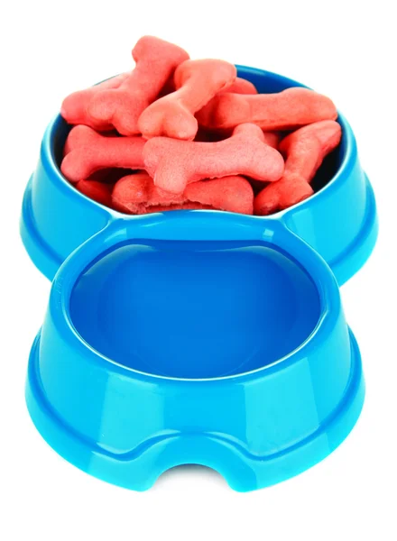 Dry dog treats in bowl isolated on white — Stock Photo, Image
