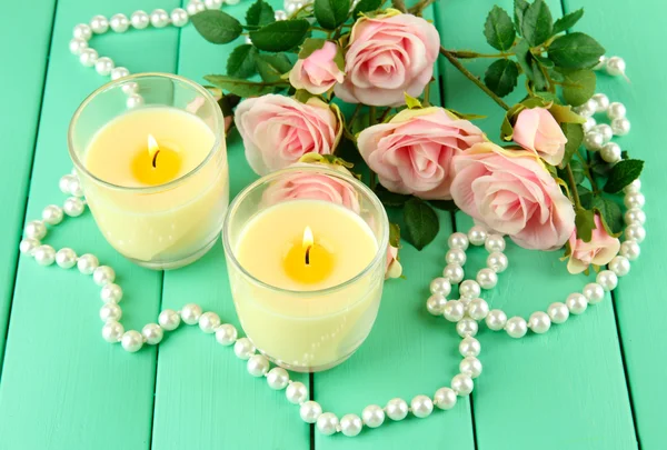 Candles on wooden table close-up — Stock Photo, Image