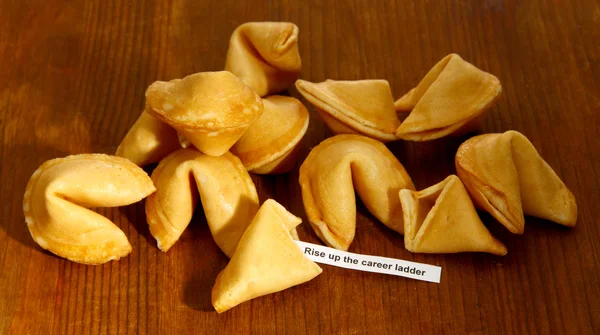 Fortune cookies on wooden table — Stock Photo, Image