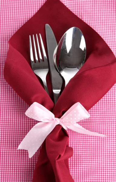 Fork,spoon,knife and napkin on bright background — Stok fotoğraf