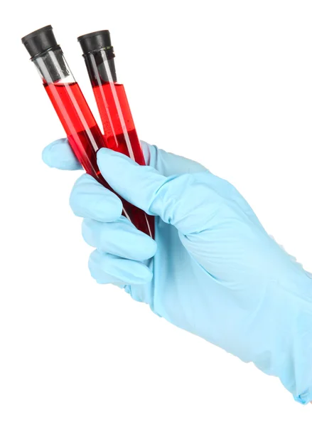 Reagenzgläser mit Blut in der Hand isoliert auf weiß — Stockfoto