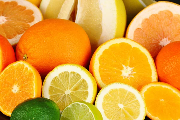 Lots ripe citrus close-up background — Stock Photo, Image