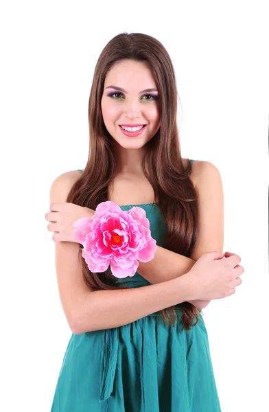 Menina bonita nova em vestido verde e flor decorativa em sua mão, isolado em branco — Fotografia de Stock