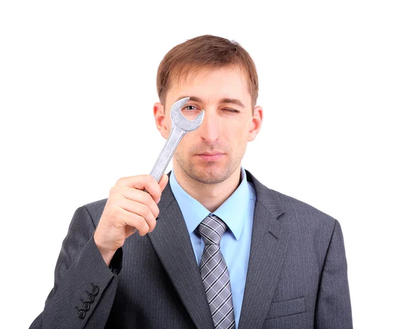 Young businessman with wrench — Stock Photo, Image