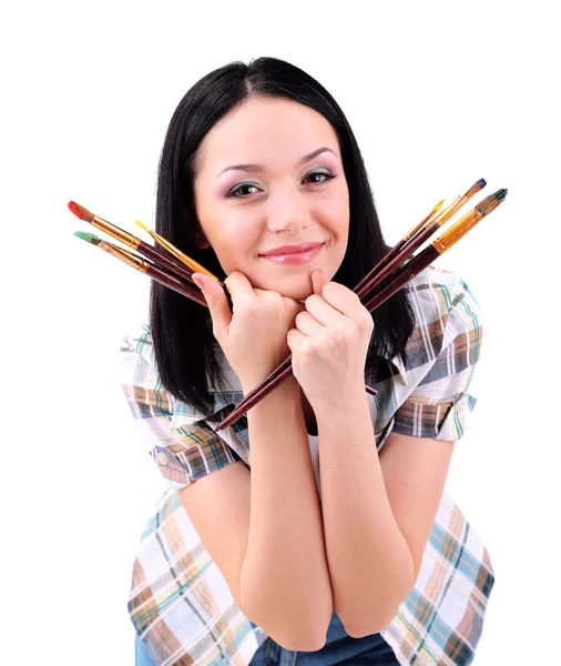 Mooie jonge vrouw schilder met penselen, geïsoleerd op wit — Stockfoto