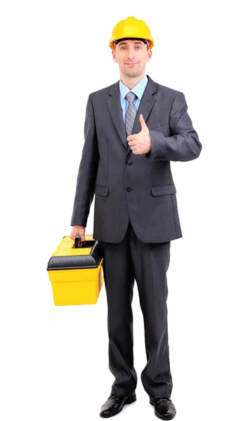 Молодой бизнесмен в шлеме с коробкой — стоковое фото