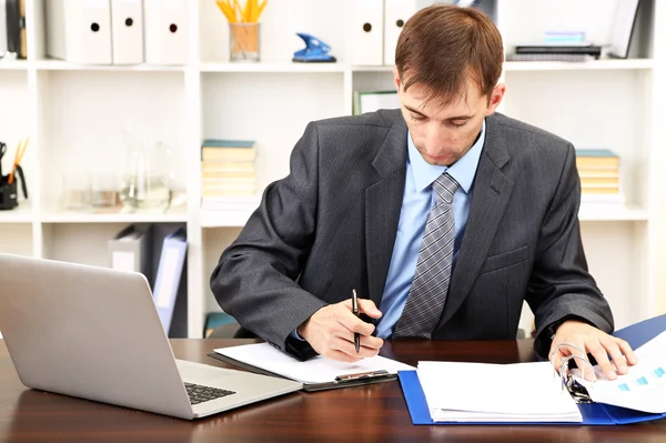 Young businessman in office Stock Photo