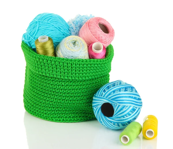 Colorful yarn for knitting in green basket — Stock Photo, Image