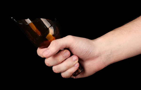 Mannenhand met gebroken glas fles — Stockfoto