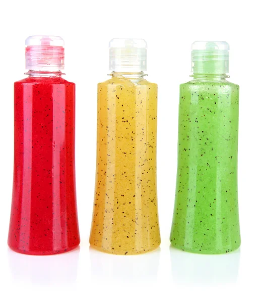 Botellas con exfoliante aislado en blanco —  Fotos de Stock