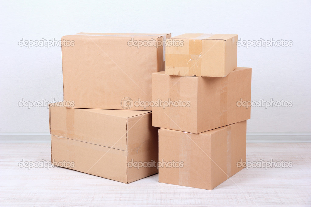 Different cardboard boxes in room