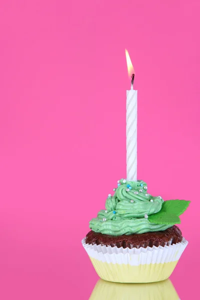 Beautiful cupcake with candle on pink background — Stock Photo, Image